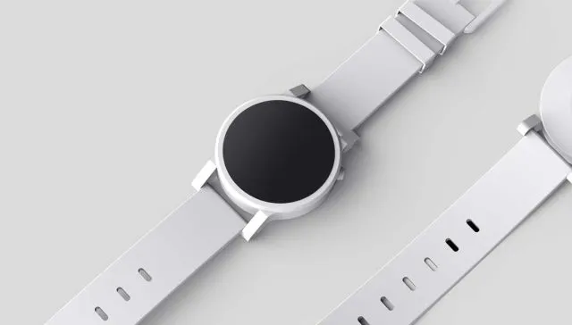 Eine Uhr mit schwarzem Zifferblatt und weißem Armband, die ein Alleinstellungsmerkmal darstellt.