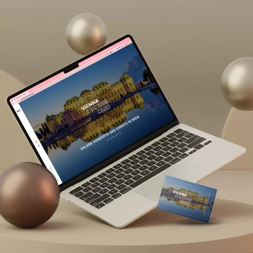 Ein Laptop wird auf einen Tisch gestellt.